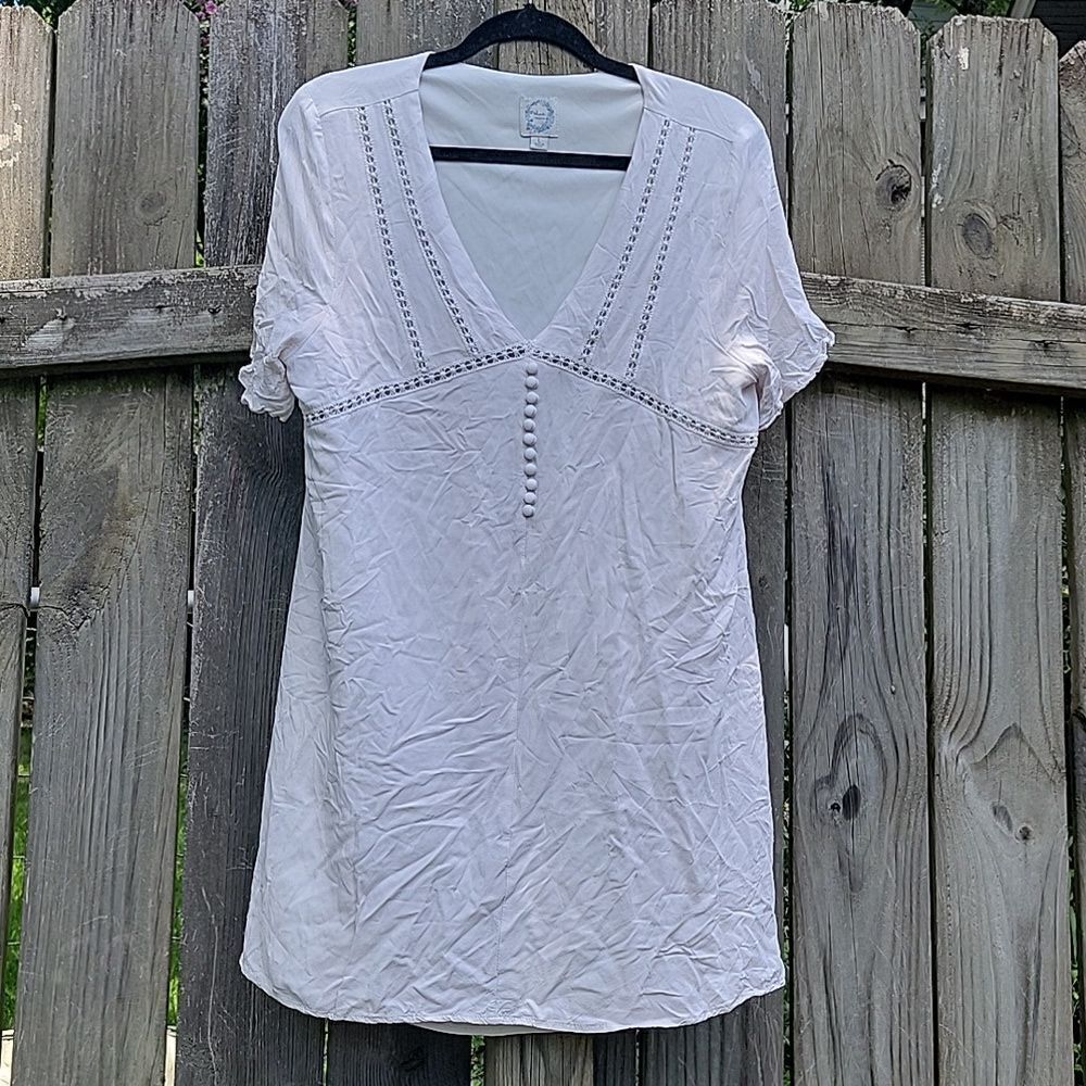 White mini dress with lace and button